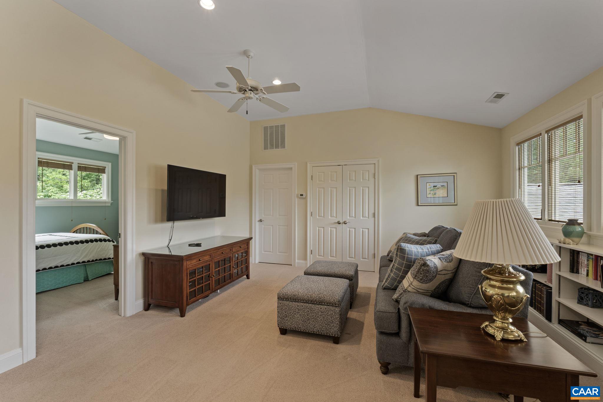 2025 Farringdon Road Keswick, VA 22947 - Photo 41 of 55 a living room with furniture and a flat screen tv