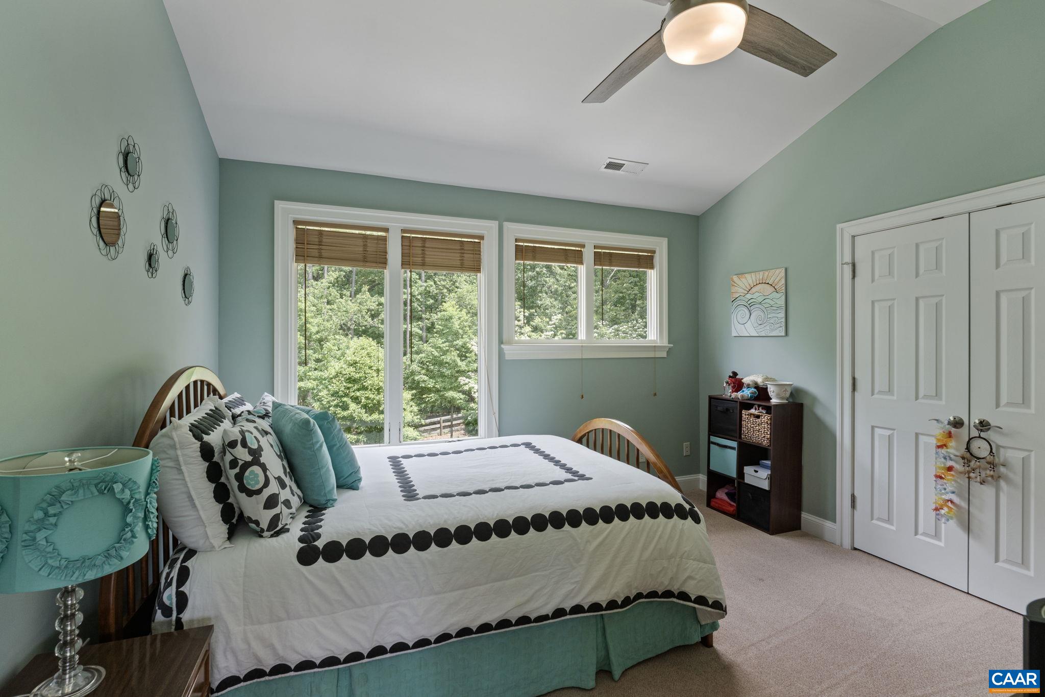 2025 Farringdon Road Keswick, VA 22947 - Photo 42 of 55 a bedroom with a bed and a window