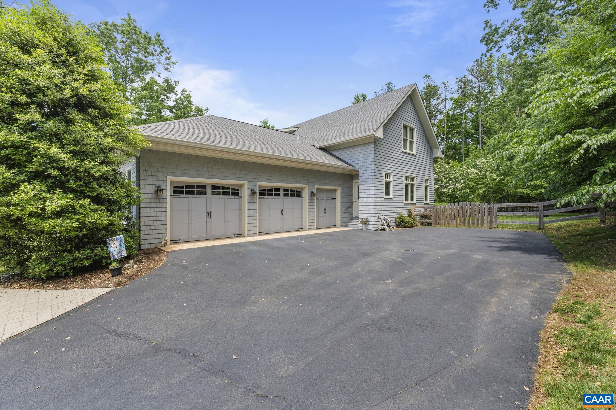 2025 Farringdon Road Keswick, VA 22947 - Photo 50 of 55 a view of a house with a backyard