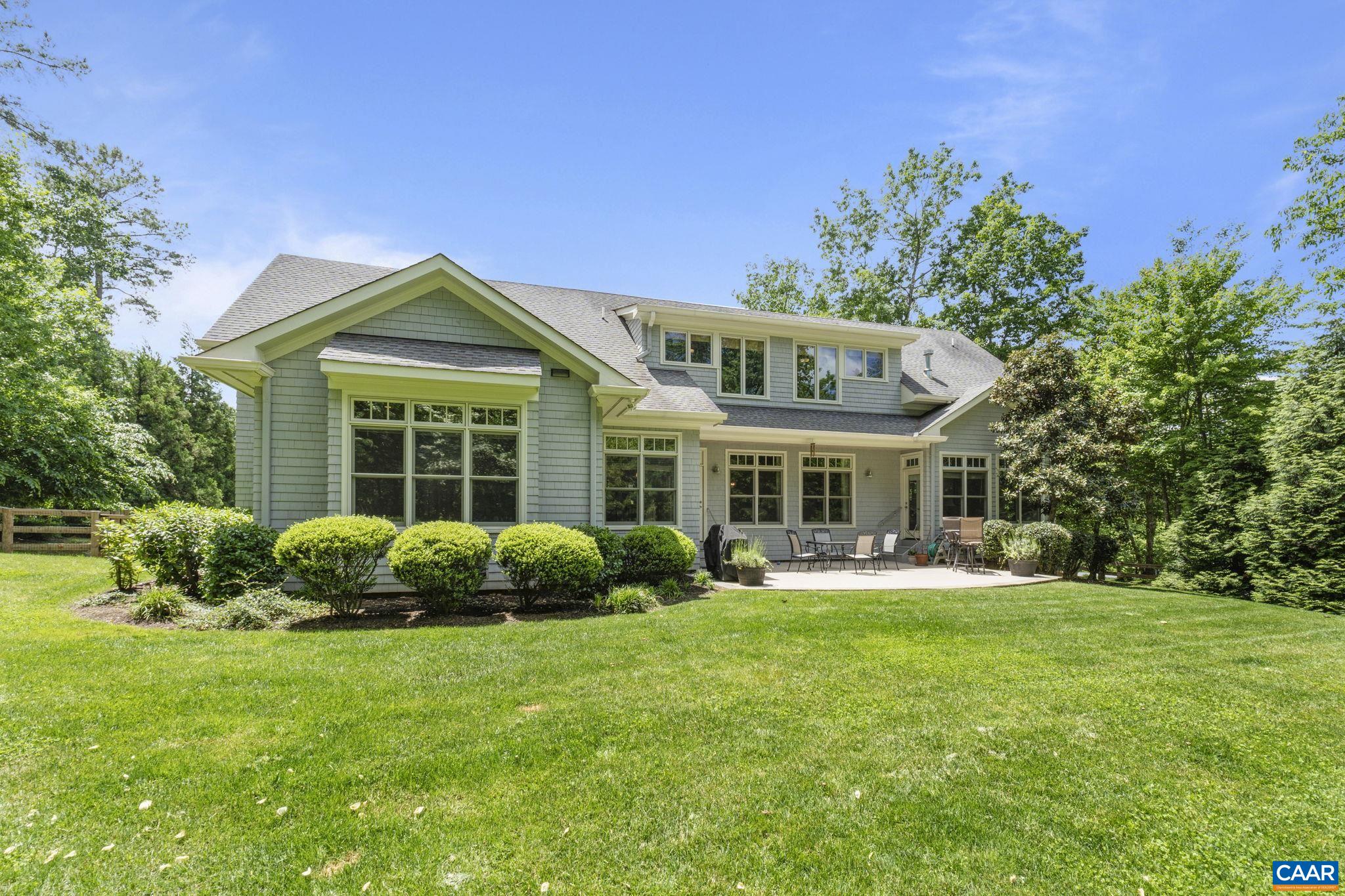 2025 Farringdon Road Keswick, VA 22947 - Photo 51 of 55 a front view of a house with a yard