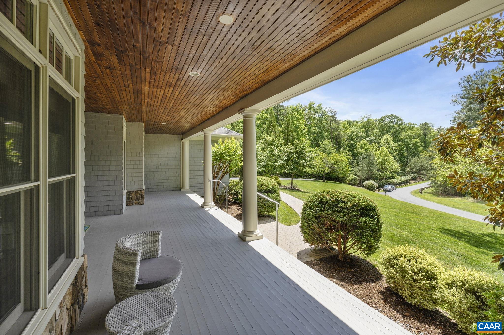 2025 Farringdon Road Keswick, VA 22947 - Photo 7 of 55 a view of a porch with furniture and garden
