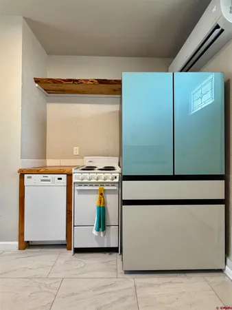a utility room with washer and dryer