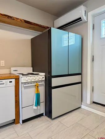 a utility room with washer and dryer