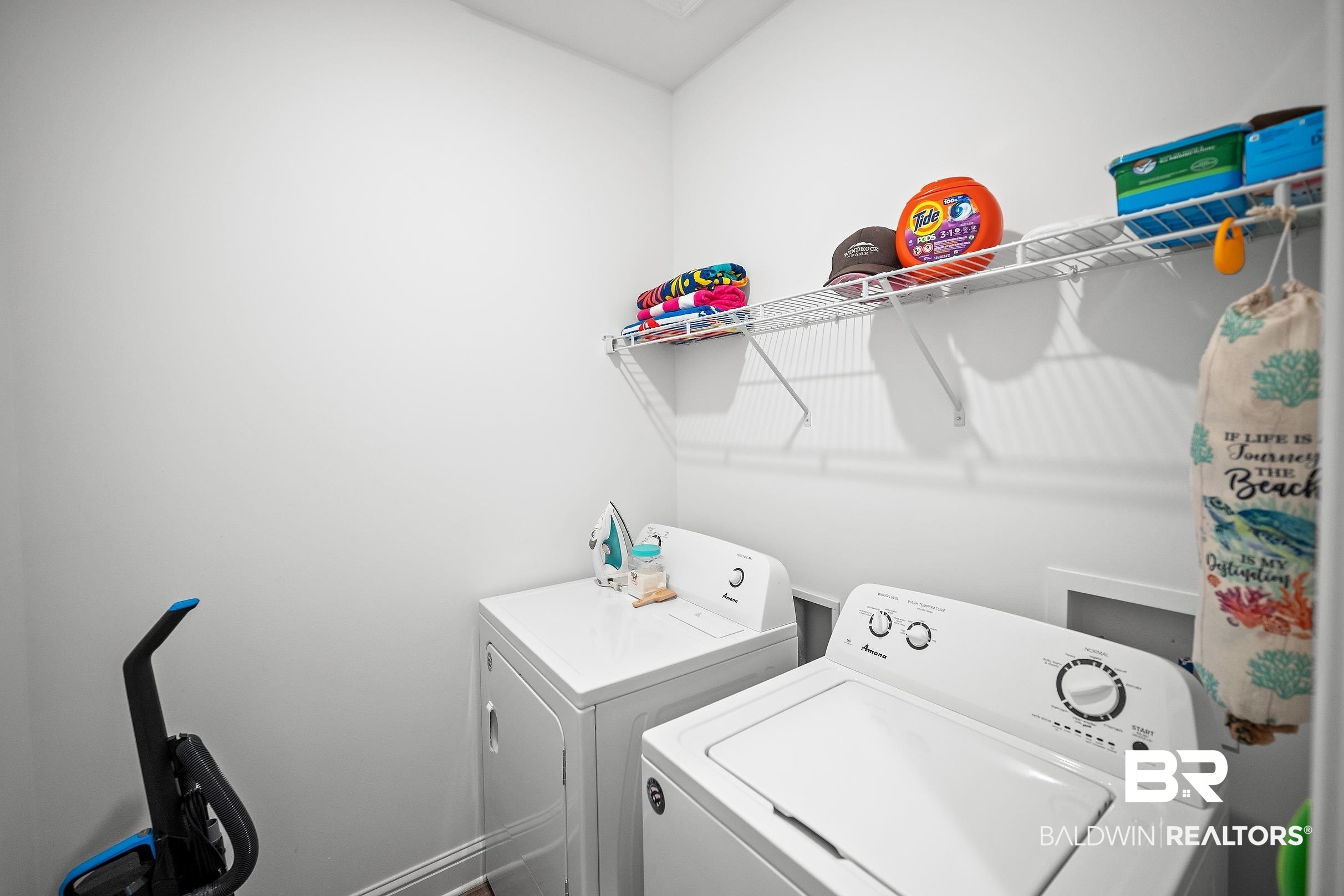 2651 South Juniper Street, Unit 2002 Foley, AL 36535 - Photo 21 of 23 Dedicated laundry space with white walls and baseboards