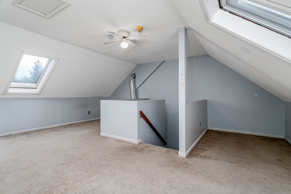 164 Ayer Road, Unit F4 Shirley, MA 01464 - Photo 21 of 34 a view of an empty room with a window