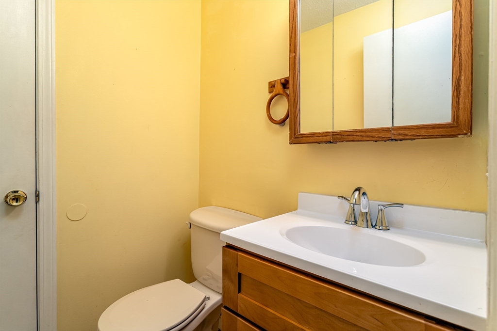 164 Ayer Road, Unit F4 Shirley, MA 01464 - Photo 6 of 34 a bathroom with a sink and a mirror