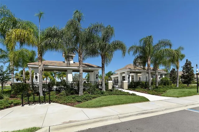 a swimming pool with outdoor seating and yard