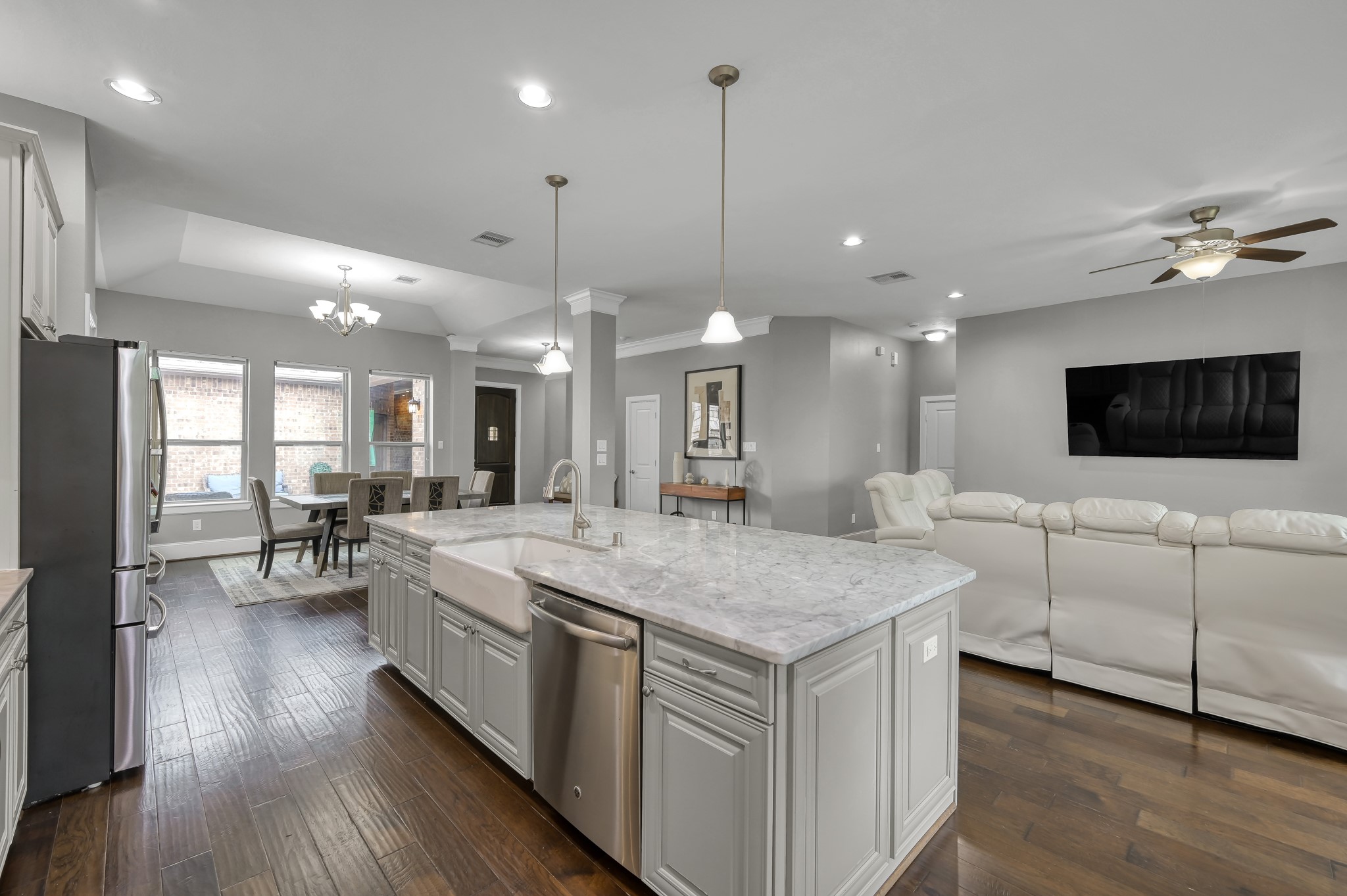31714 Pierwood Court Spring, TX 77386 - Photo 19 of 49 a large kitchen with stainless steel appliances kitchen island a large island in the center