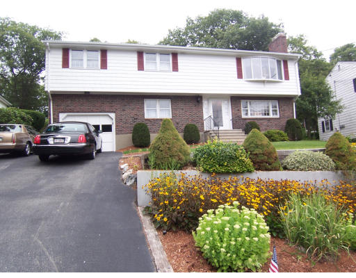 267 Ridge Street Arlington, MA 02474 - Photo 1 of 18 a view of a car park in front of house