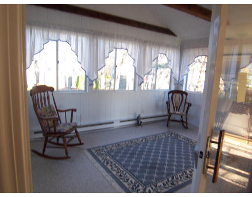 267 Ridge Street Arlington, MA 02474 - Photo 10 of 18 a living room with furniture and a window