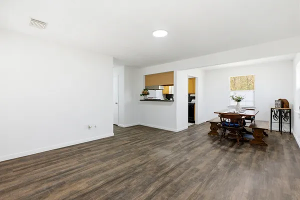 a view of livingroom with furniture and wooden floor