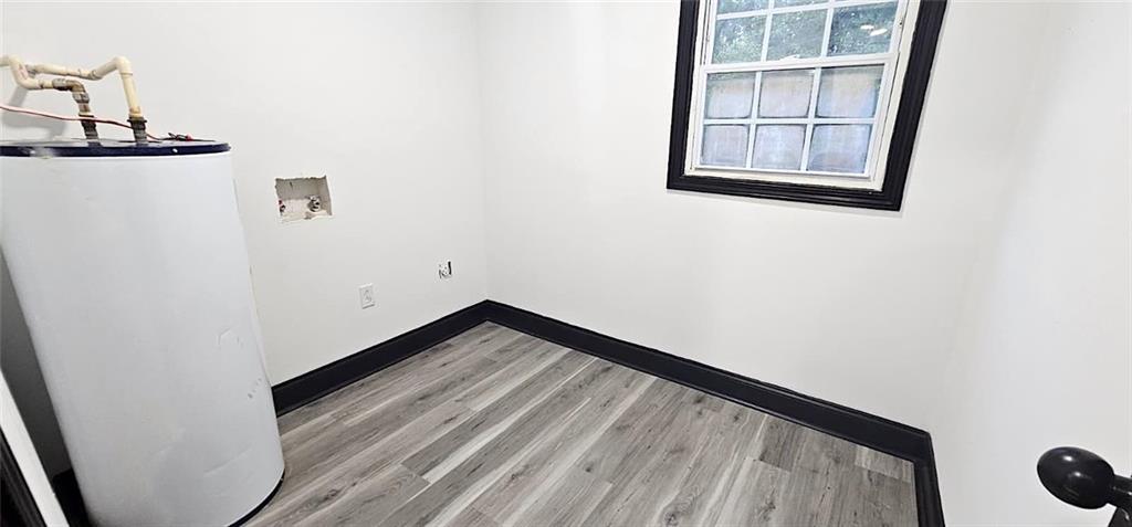 2895 Turner Church Road McDonough, GA 30252 - Photo 22 of 25 a view of a hallway with wooden floor