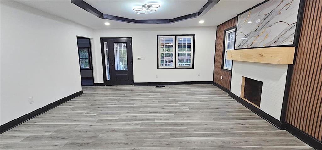 2895 Turner Church Road McDonough, GA 30252 - Photo 7 of 25 a view of an empty room with wooden floor and a window