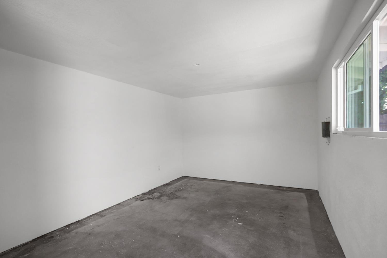 2832 Fowler Road Ceres, CA 95307 - Photo 28 of 28 an empty room with a window