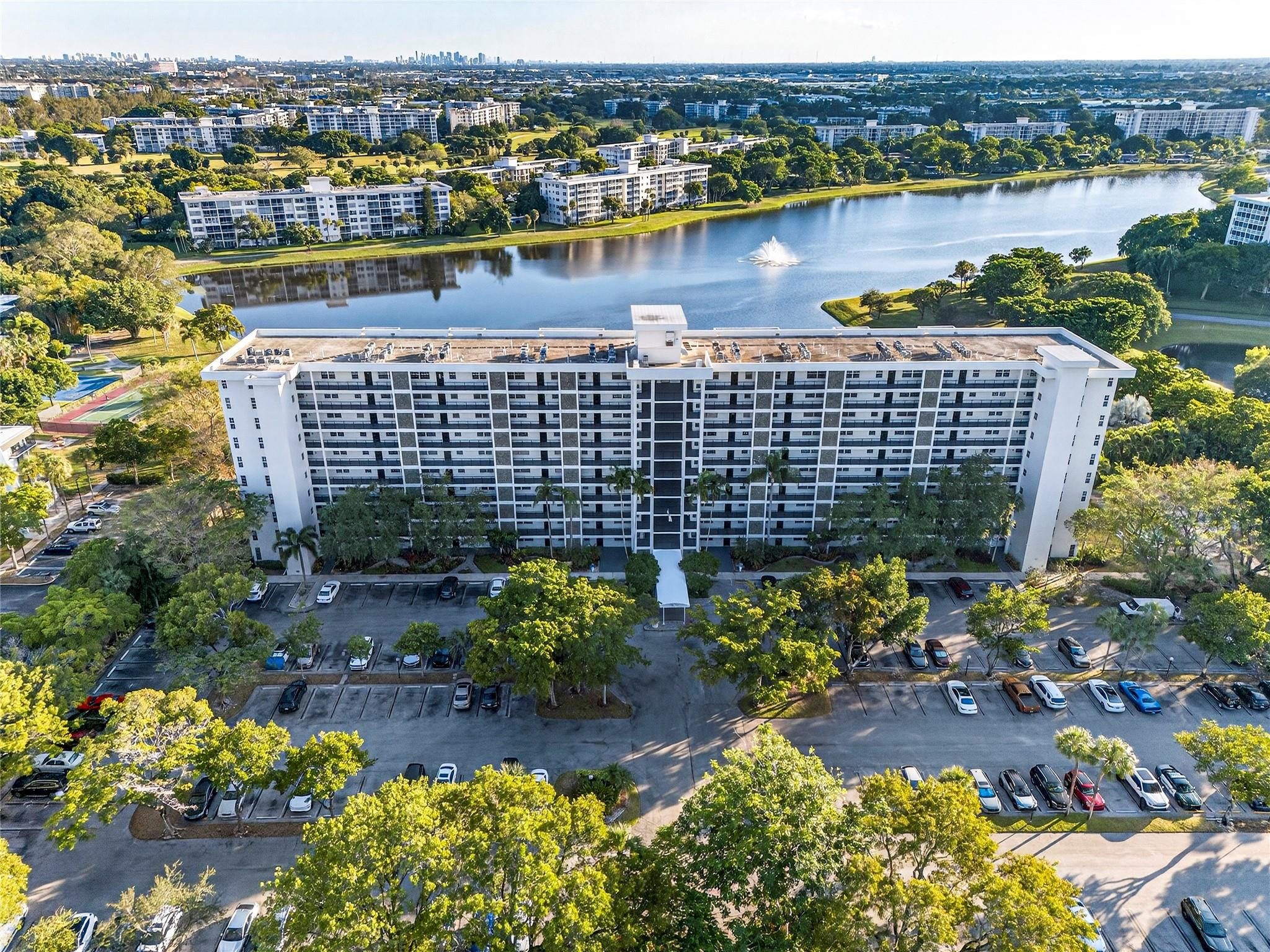 2900 North Course Drive, Unit 607 Pompano Beach, FL 33069 - Photo 4 of 48 a view of a lake with a city view