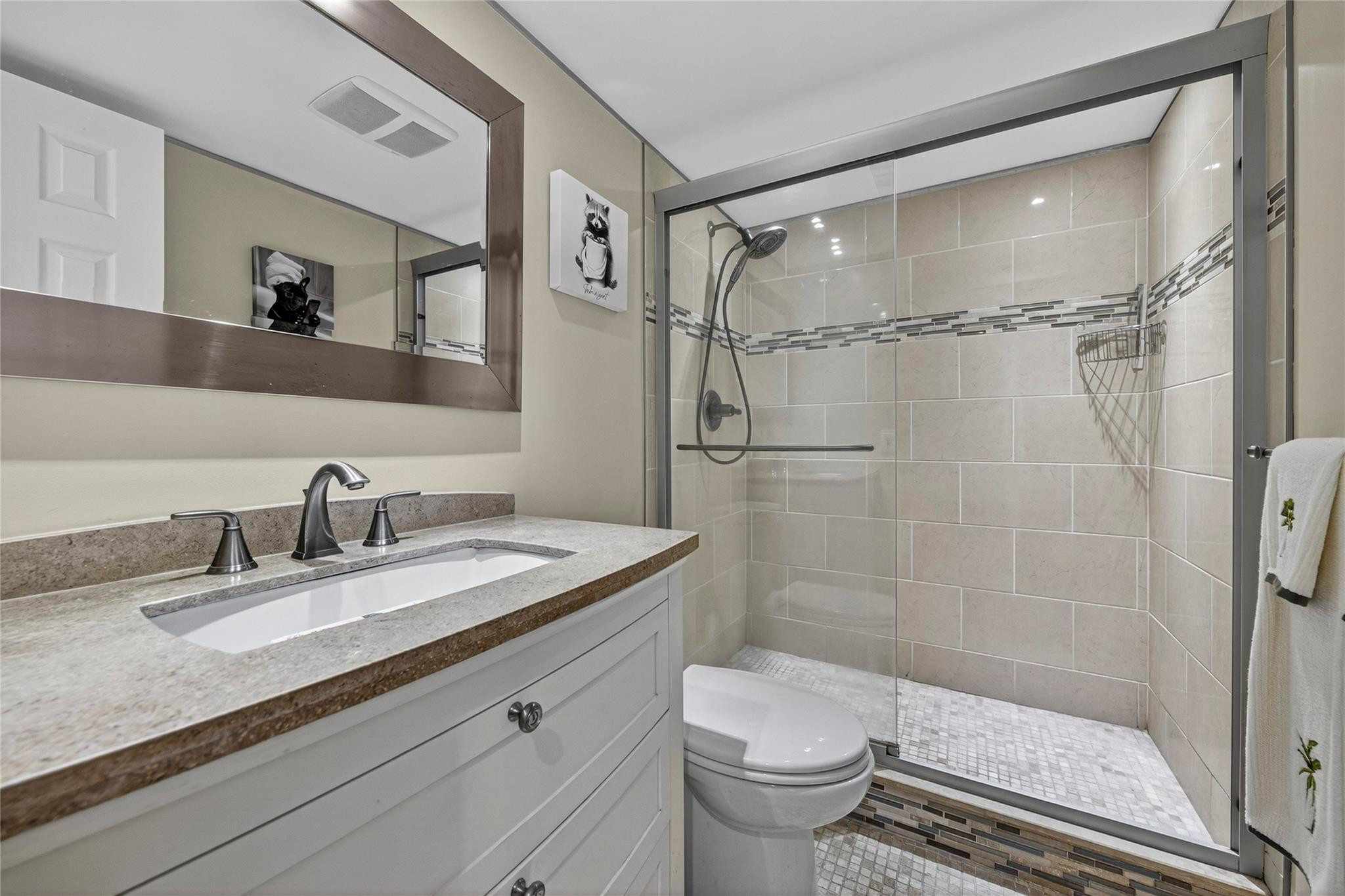 2900 North Course Drive, Unit 607 Pompano Beach, FL 33069 - Photo 41 of 48 a bathroom with a granite countertop sink toilet and shower