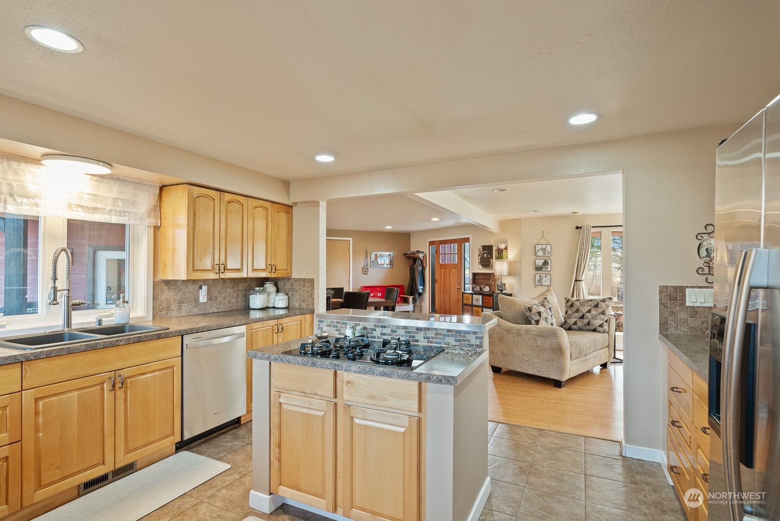 2820 Douglas Road Ferndale, WA 98248 - Photo 12 of 40 a kitchen with white cabinets and sink