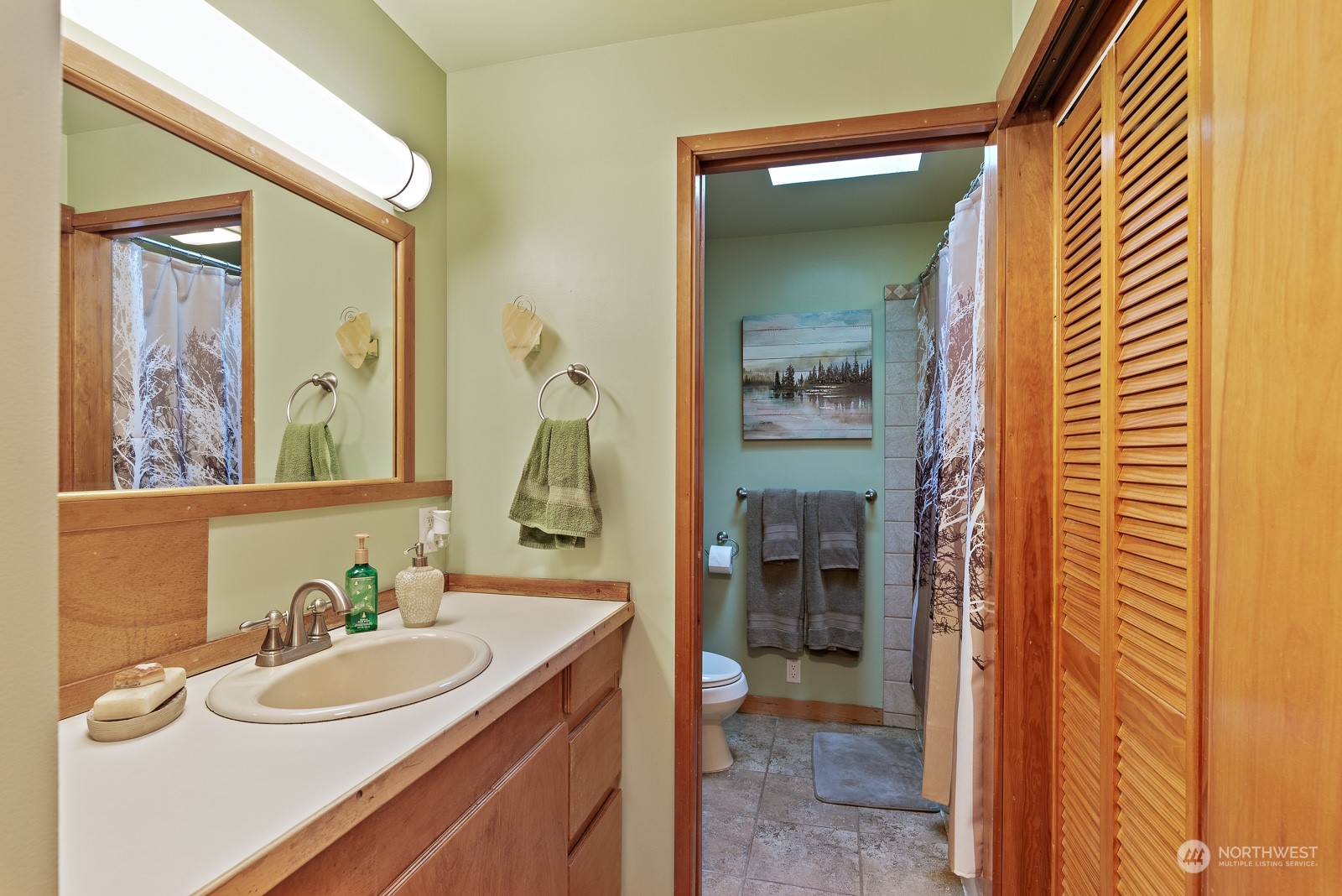 2820 Douglas Road Ferndale, WA 98248 - Photo 20 of 40 a bathroom with a sink and a mirror
