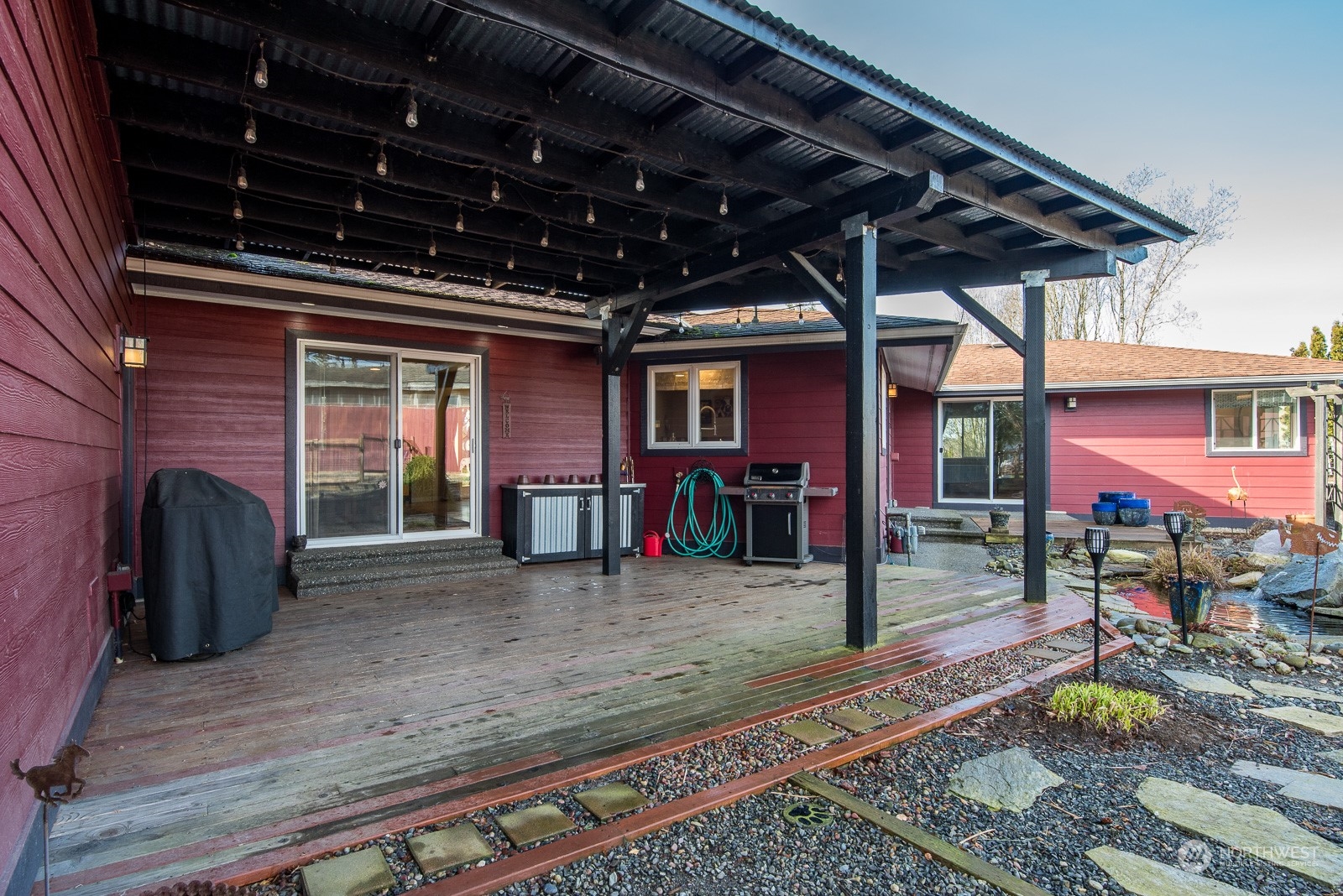 2820 Douglas Road Ferndale, WA 98248 - Photo 25 of 40 a view of a porch with furniture and a table