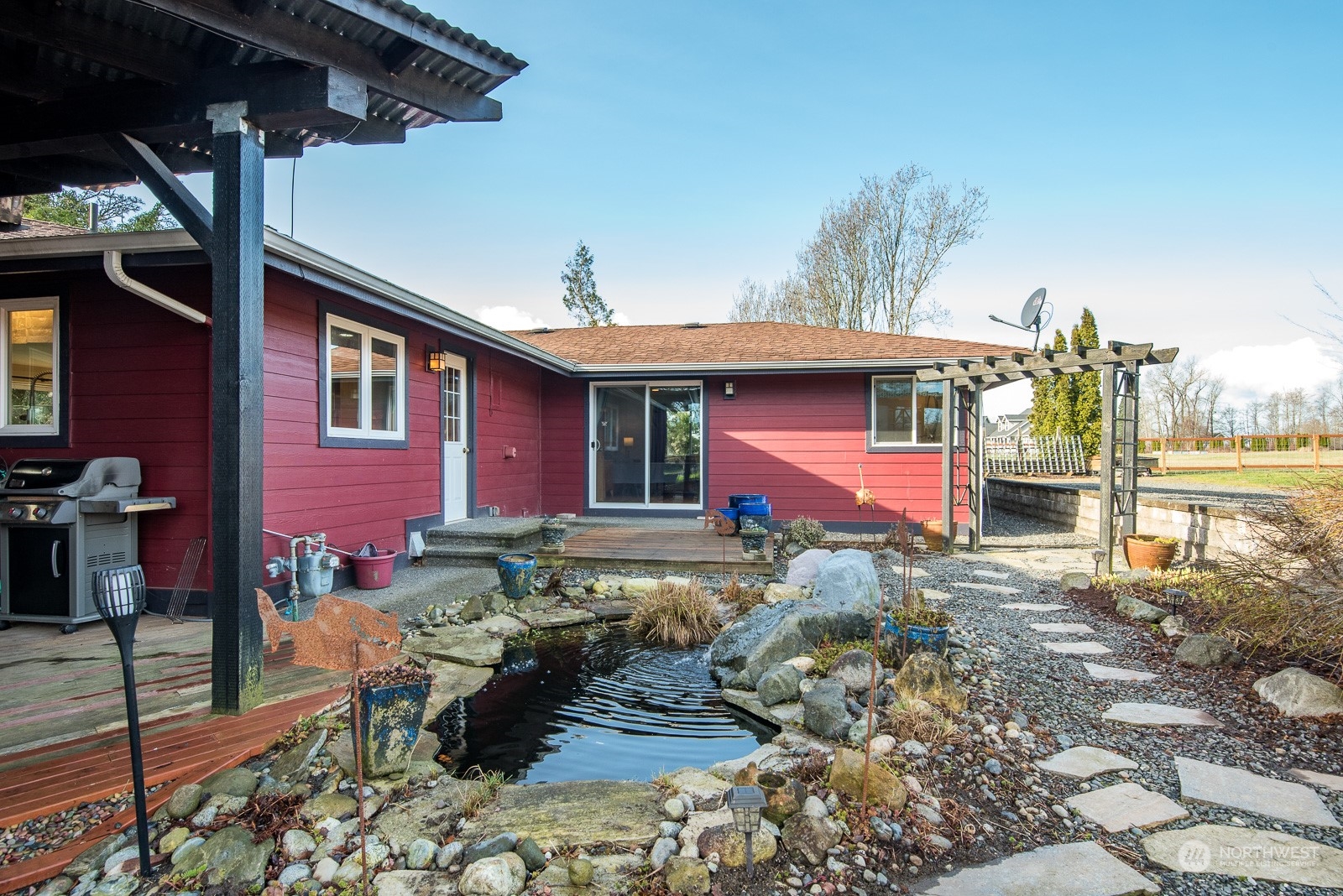 2820 Douglas Road Ferndale, WA 98248 - Photo 27 of 40 a view of a house with backyard porch and sitting area