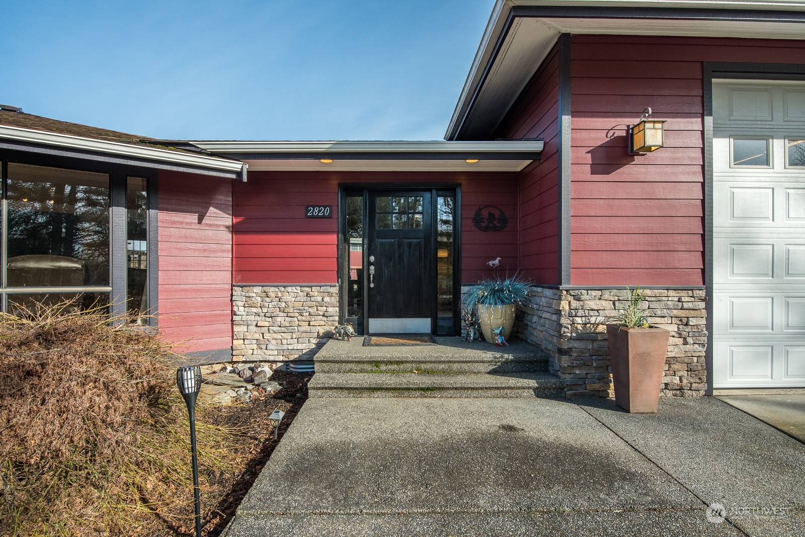 2820 Douglas Road Ferndale, WA 98248 - Photo 3 of 40 front view of a house with a porch