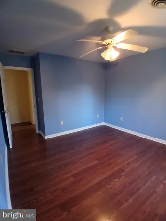 wooden floor with staircase