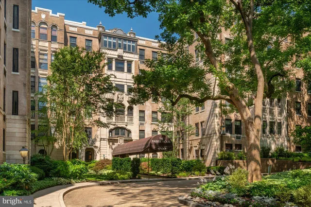 a view of a building with a yard