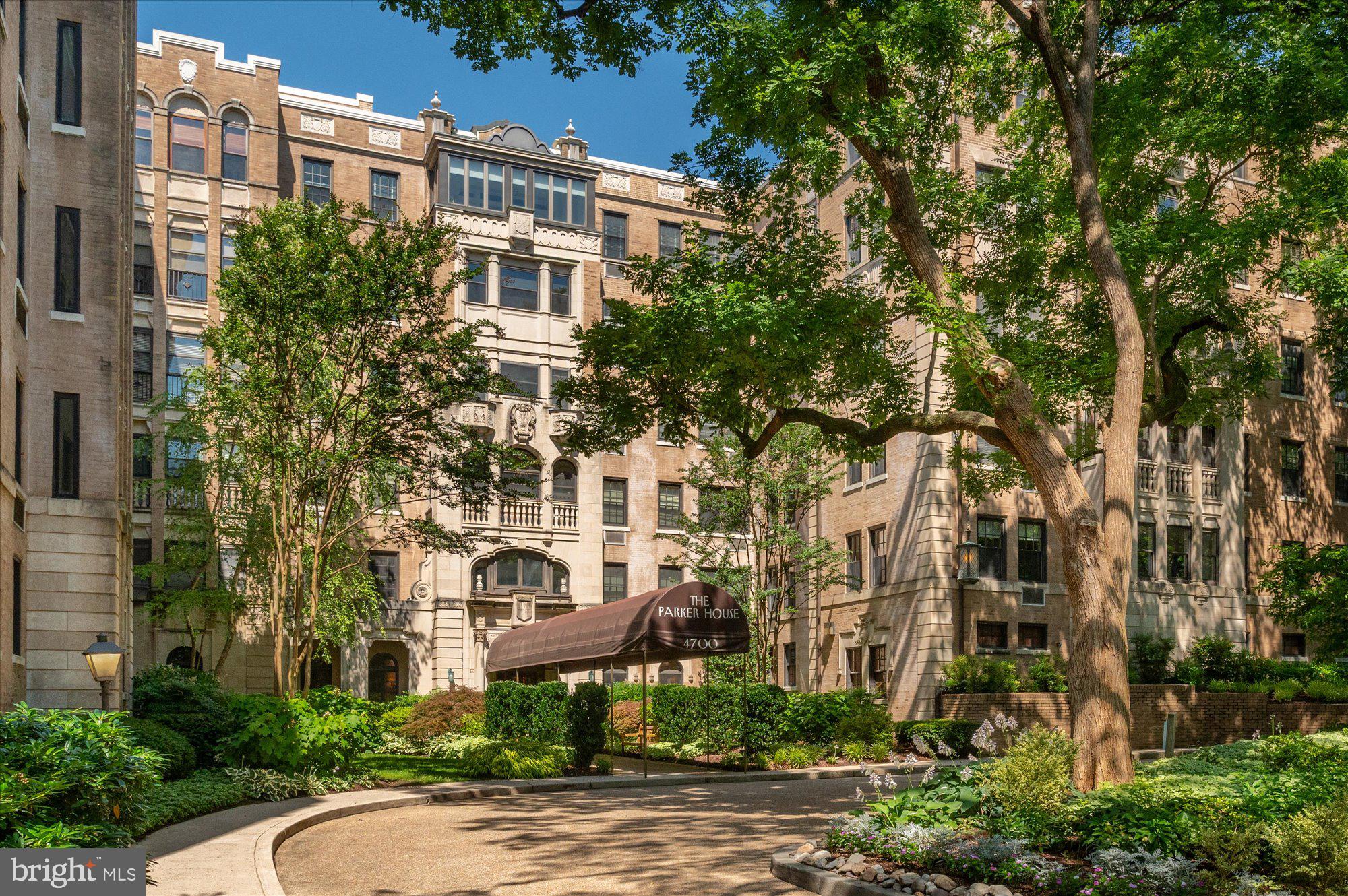 a view of a building with a yard