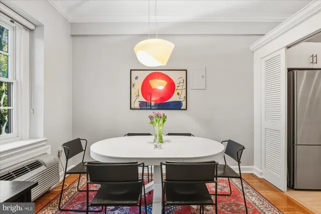 a view of a dining room with furniture