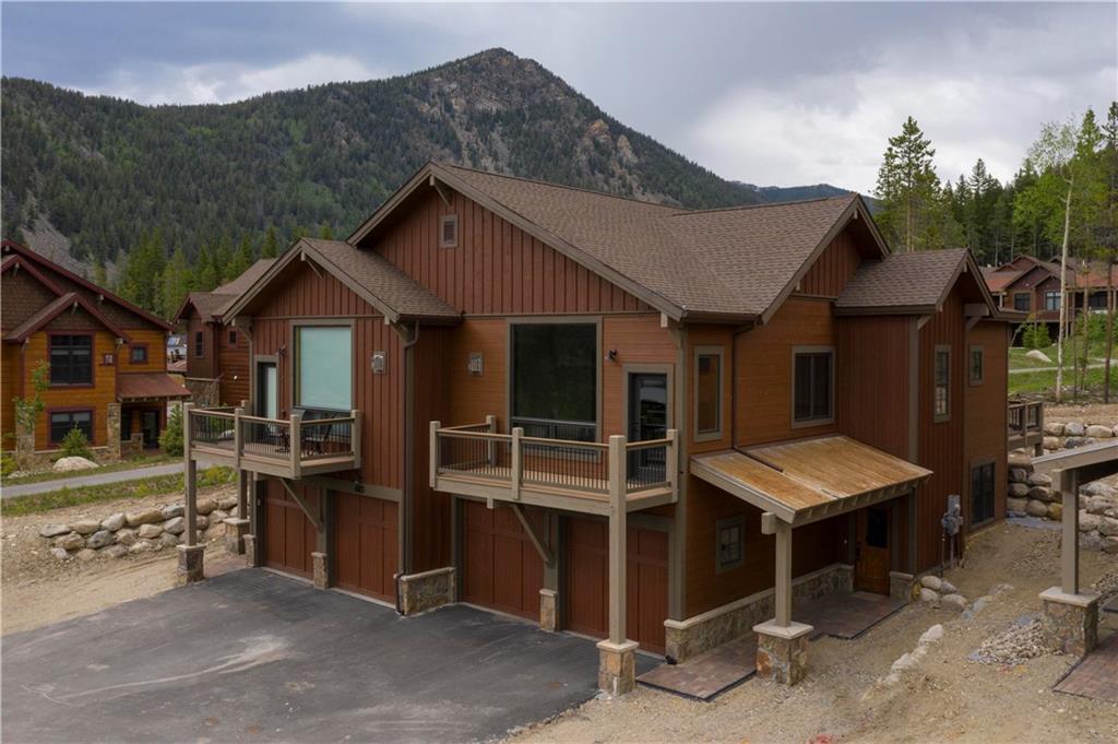 687 Independence Road Keystone, CO 80435 - Photo 1 of 26 a view of a house with a barbeque and outdoor seating