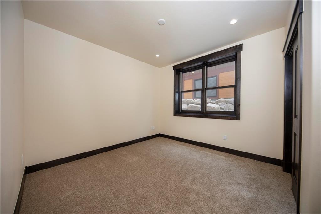 687 Independence Road Keystone, CO 80435 - Photo 13 of 26 an empty room with windows