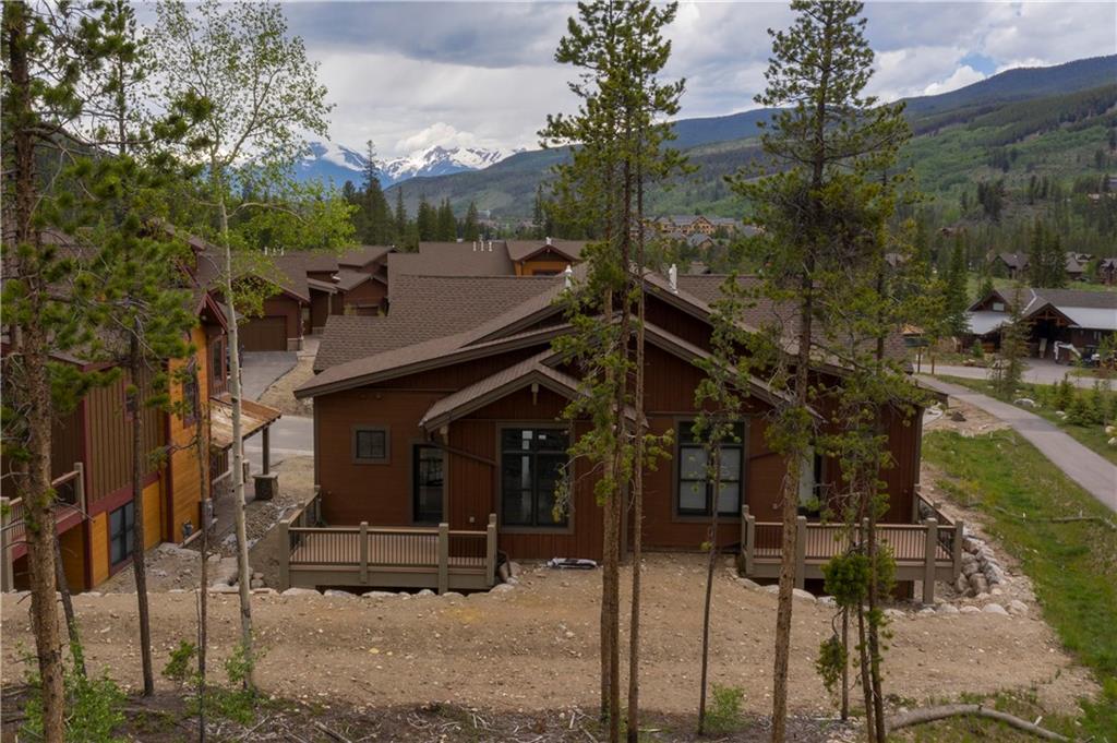 687 Independence Road Keystone, CO 80435 - Photo 24 of 26 a front view of a house with parking area