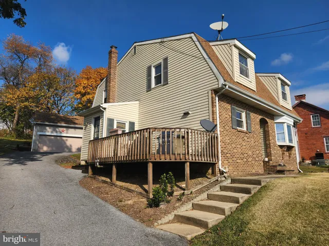 a front view of a house with a balcony
