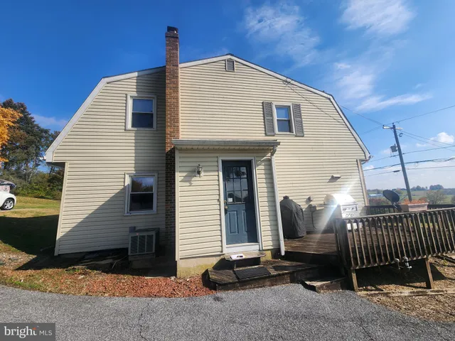a front view of a house with a garage