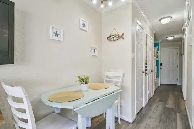 a bathroom with a sink mirror and toilet