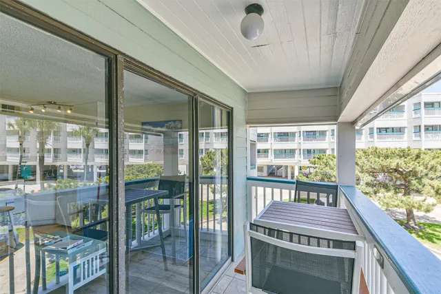 a balcony with furniture
