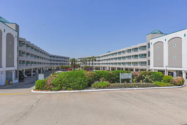 a view of a building and a garden