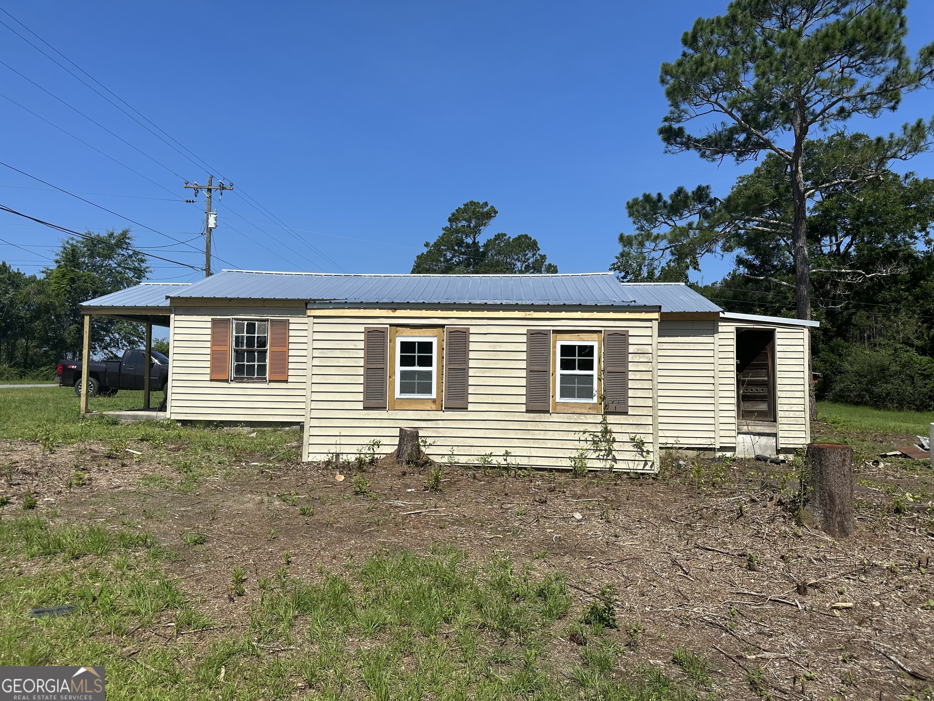 6515 Fred Bohannon Road Eastman, GA 31023 - Photo 2 of 2 a view of a house with a yard