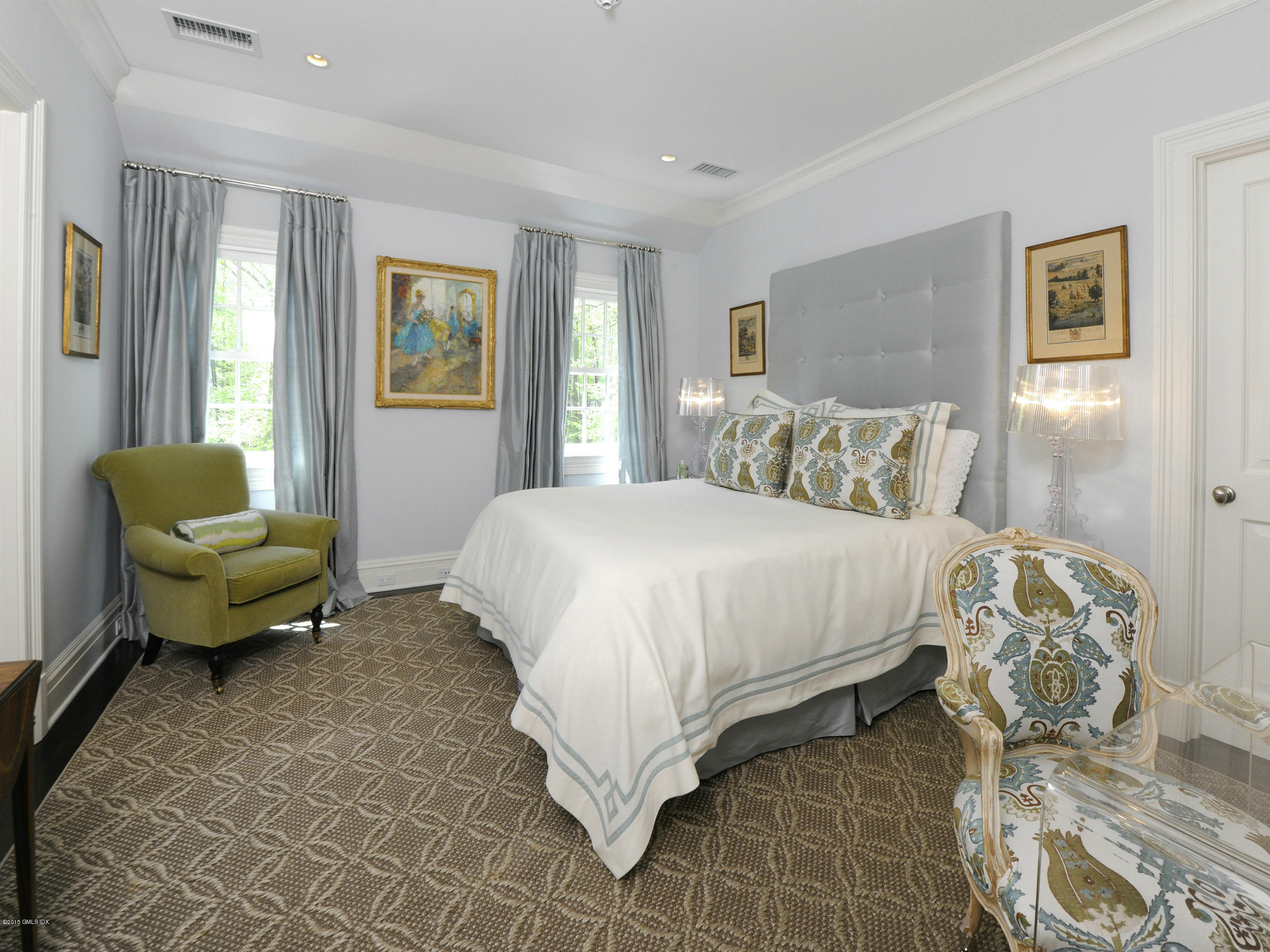 29 Butternut Hollow Road Greenwich, CT 06830 - Photo 16 of 29 a bed sitting in a spacious bedroom next to a window and a couch
