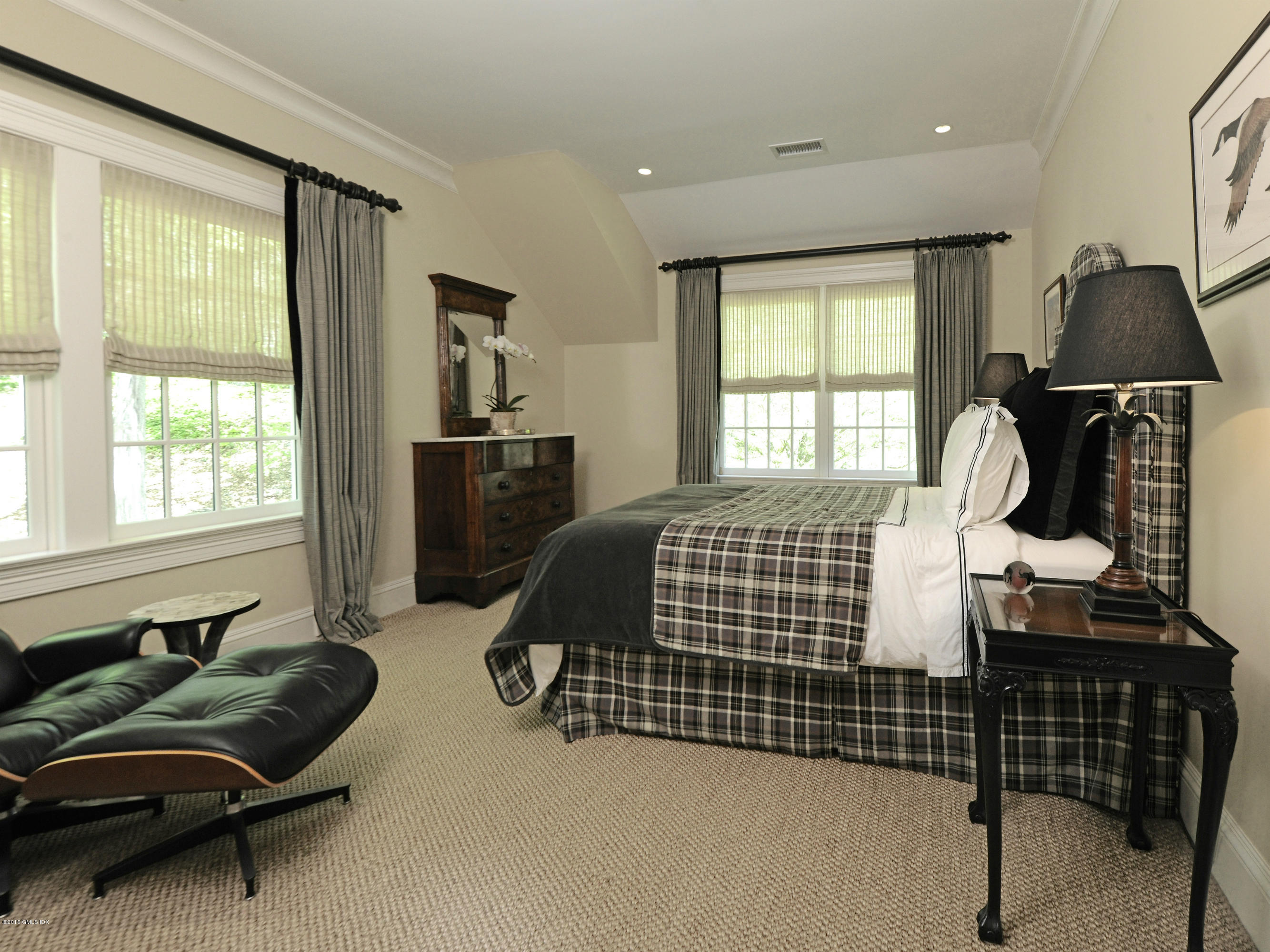 29 Butternut Hollow Road Greenwich, CT 06830 - Photo 18 of 29 a bedroom with a bed and window