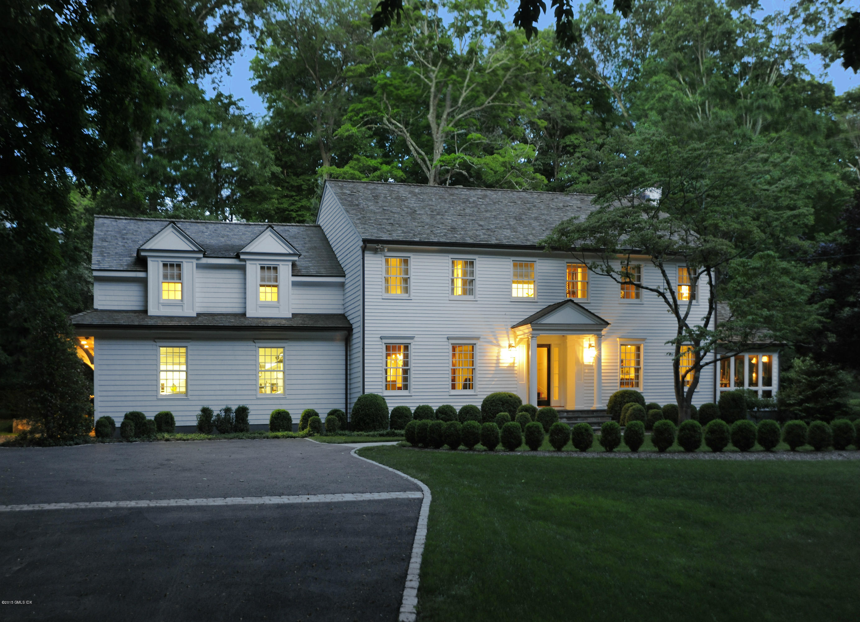 29 Butternut Hollow Road Greenwich, CT 06830 - Photo 23 of 29 a front view of a house with a garden and porch