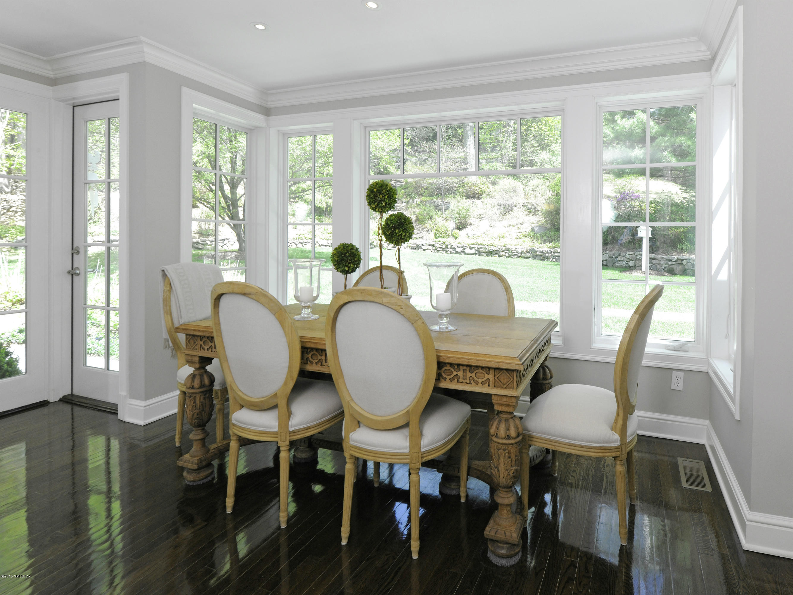 29 Butternut Hollow Road Greenwich, CT 06830 - Photo 9 of 29 a view of a dining room with furniture window and wooden floor