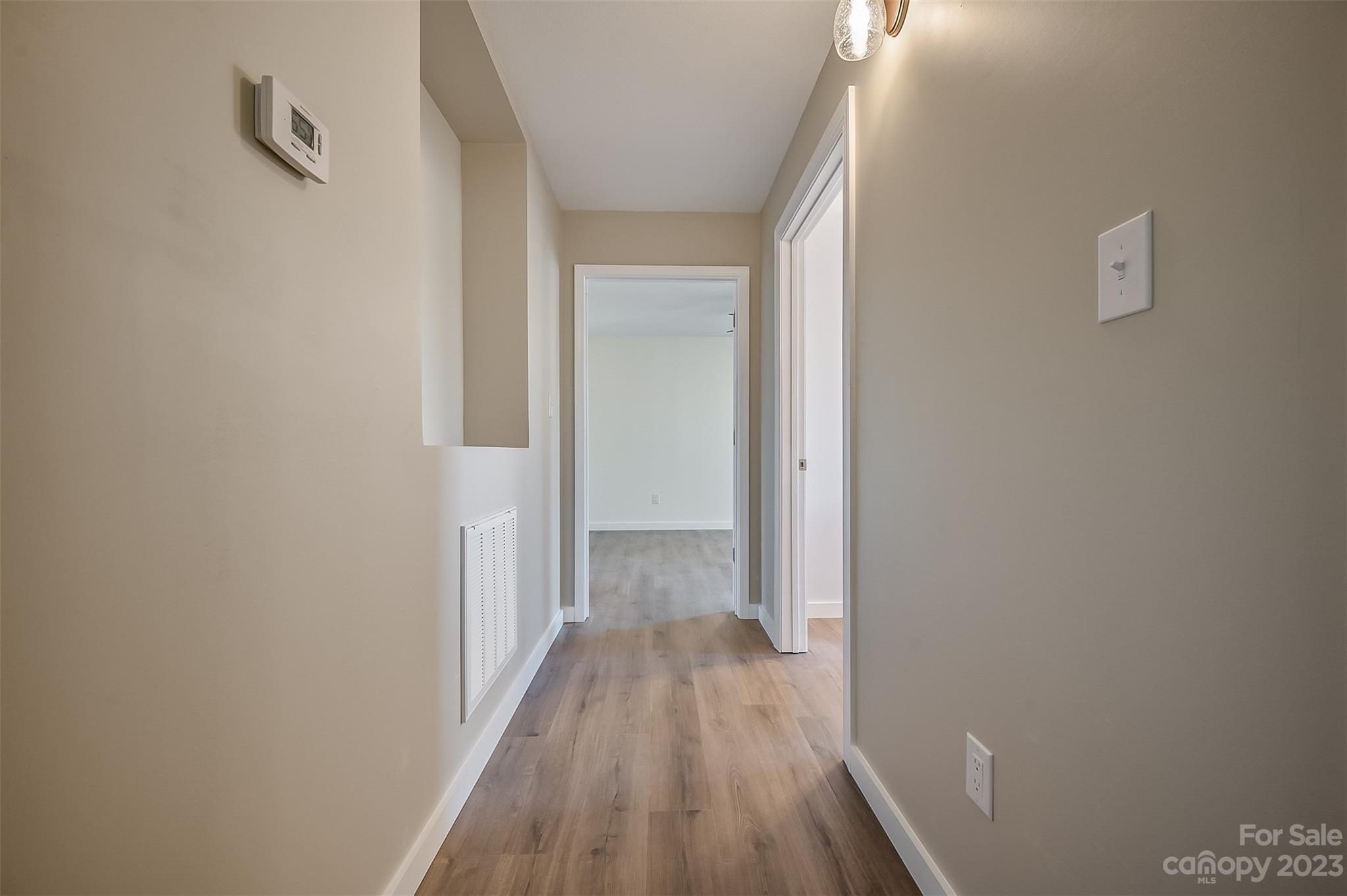 306 Observation Ridge Rutherfordton, NC 28139 - Photo 14 of 36 a view of a hallway with wooden floor