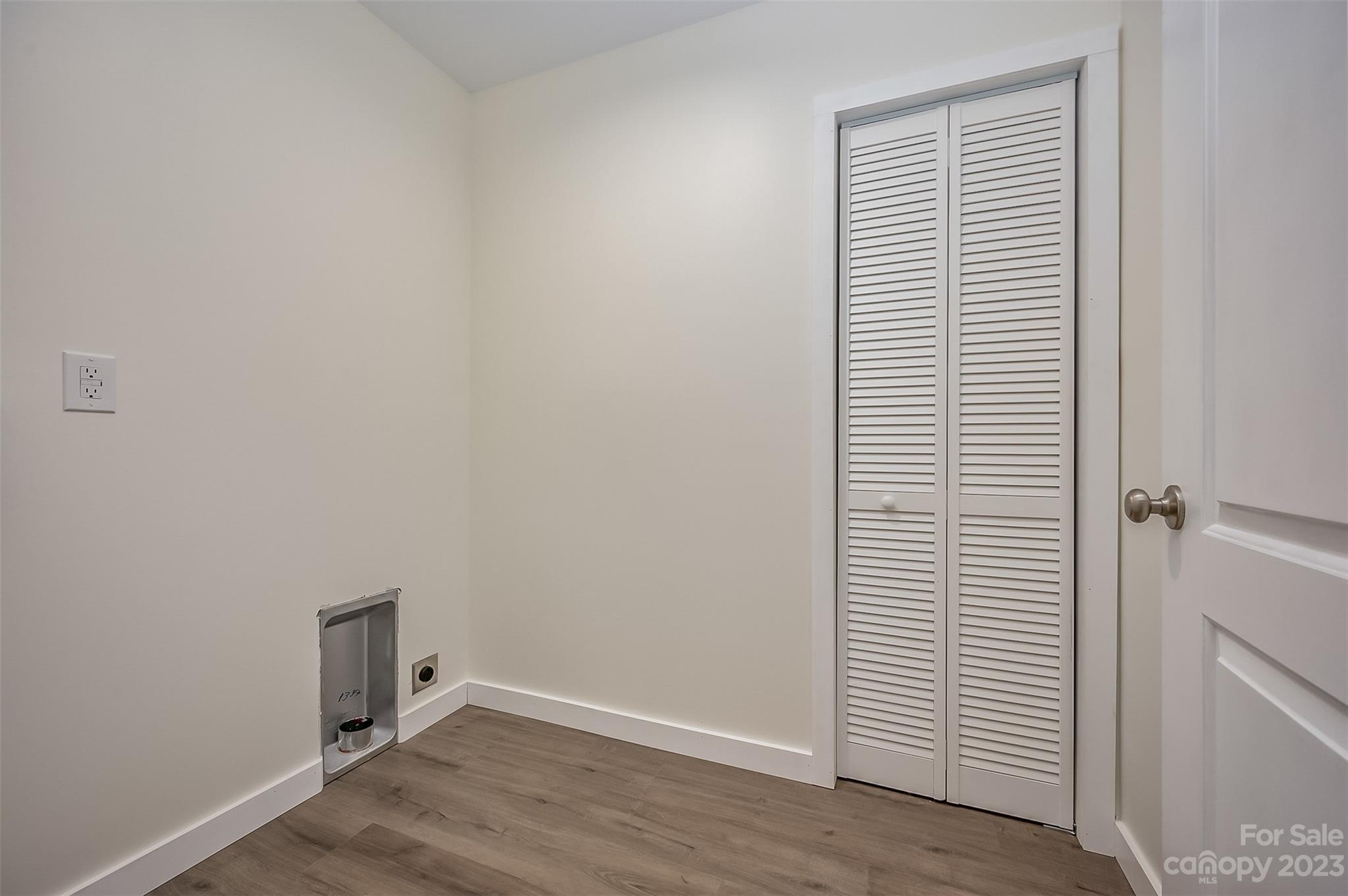 306 Observation Ridge Rutherfordton, NC 28139 - Photo 24 of 36 an empty room with wooden floor and white walls