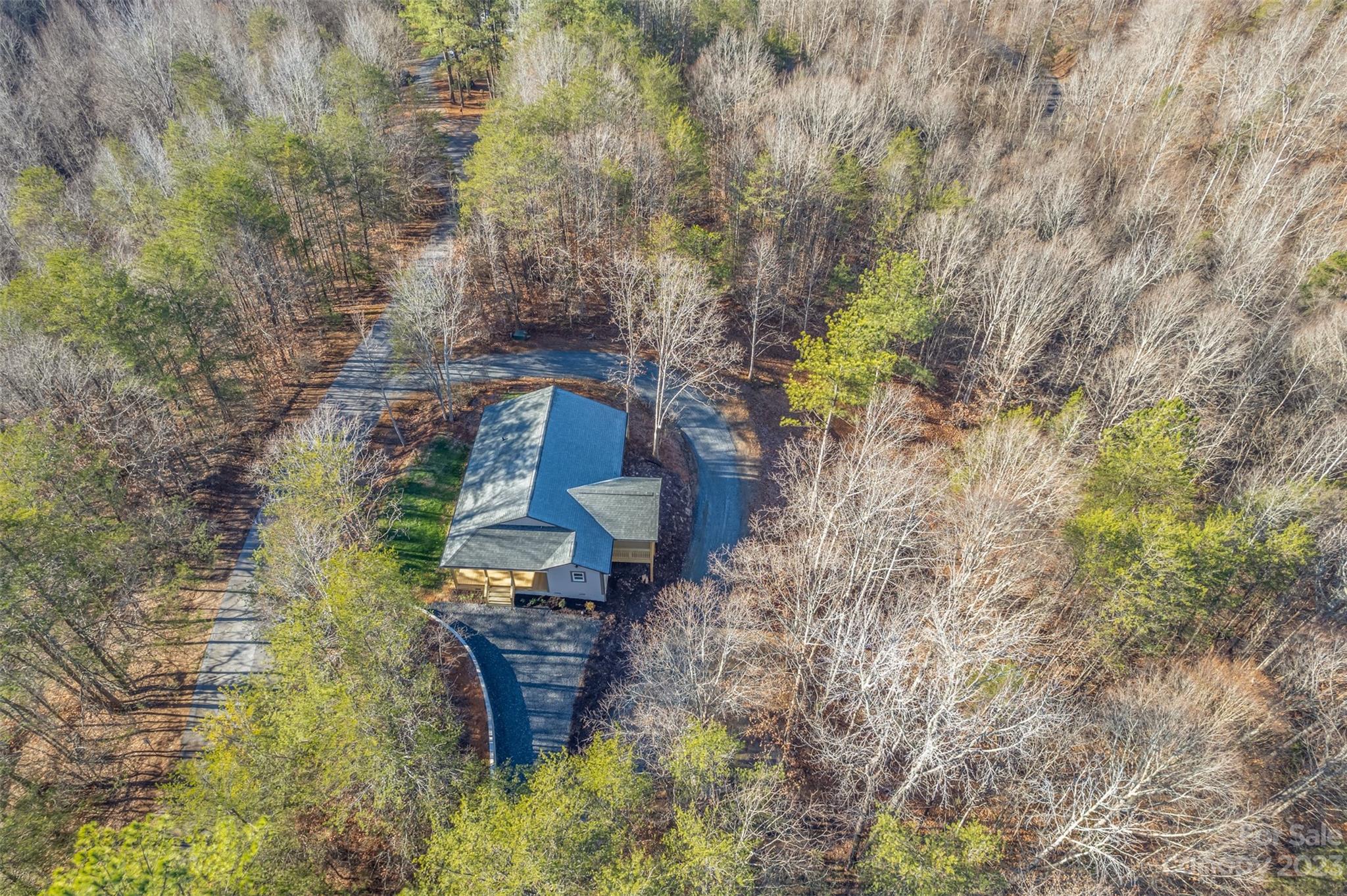 306 Observation Ridge Rutherfordton, NC 28139 - Photo 3 of 36 a backyard of a house with large trees