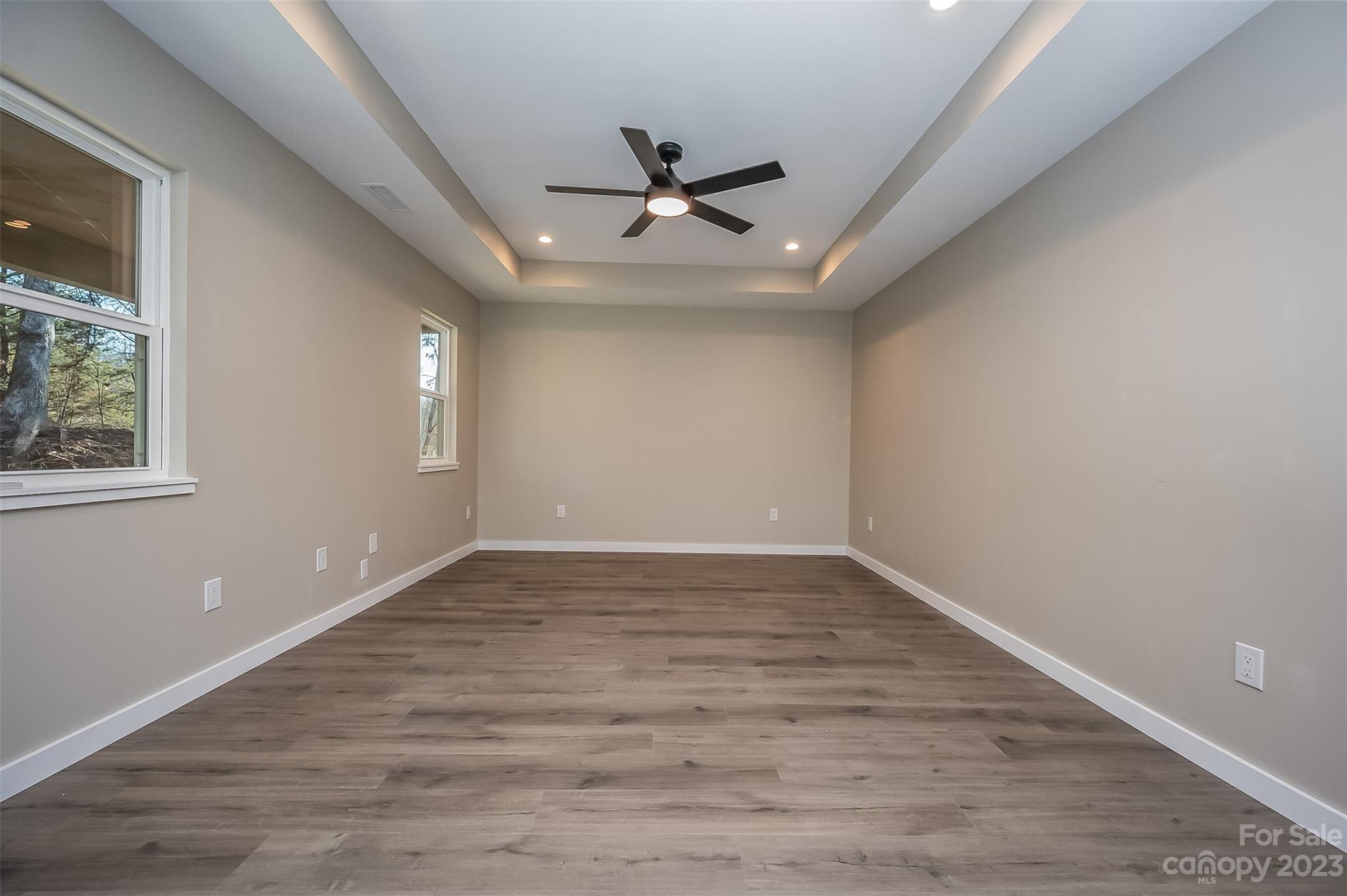 306 Observation Ridge Rutherfordton, NC 28139 - Photo 7 of 36 wooden floor in an empty room with a window