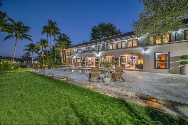 a view of a lake with a palm tree