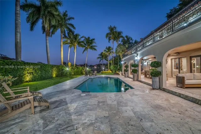 a view of a lake with houses in the back
