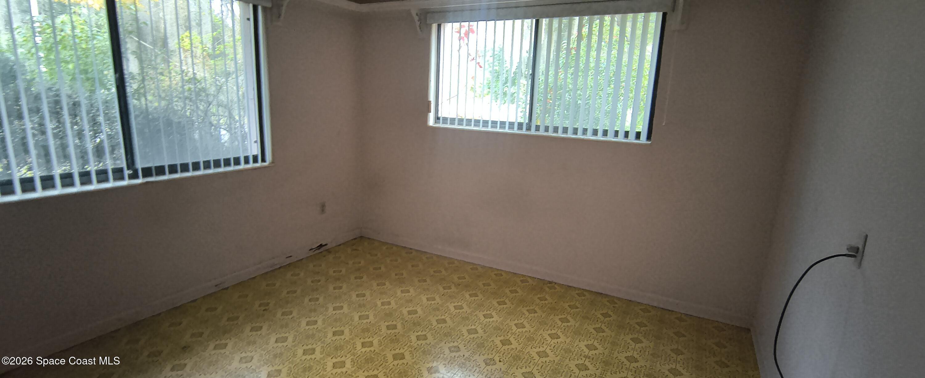 801 Espanola Way Melbourne, FL 32901 - Photo 14 of 18 a view of room with window