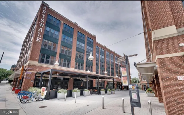 a front view of a building with street view